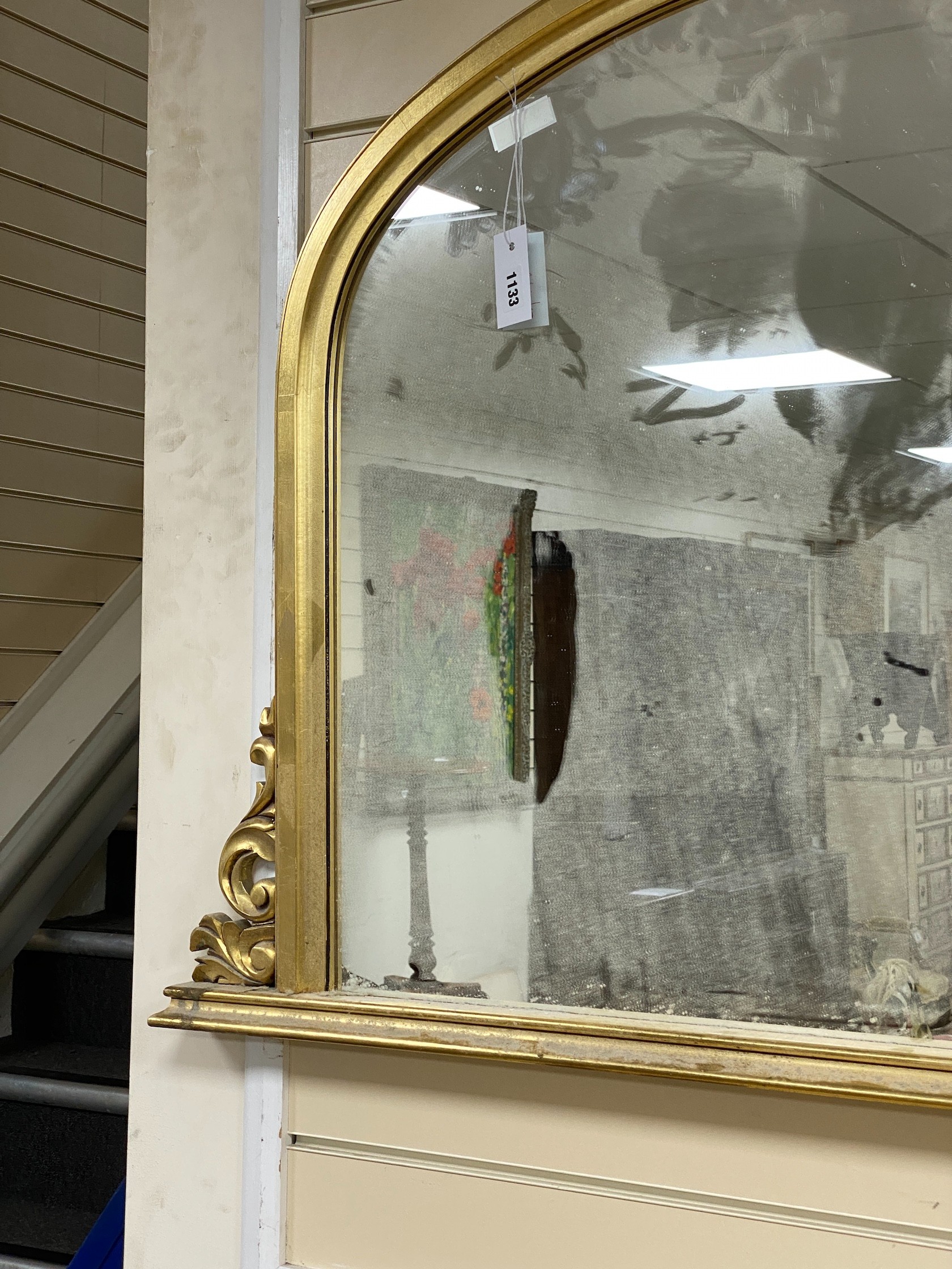 A Victorian style gilt overmantel mirror, width 128cm, height 80cm